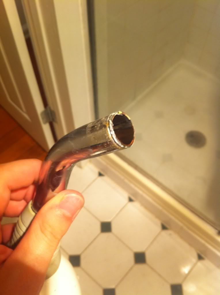 Shower head tube, snapped off of pipe in wall and no I did not go all