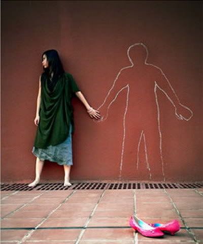 women in front of wall