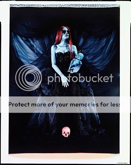 http://i306.photobucket.com/albums/nn241/Helga_Depp/04bluegirlwithskull_polaroidsmall.jpg